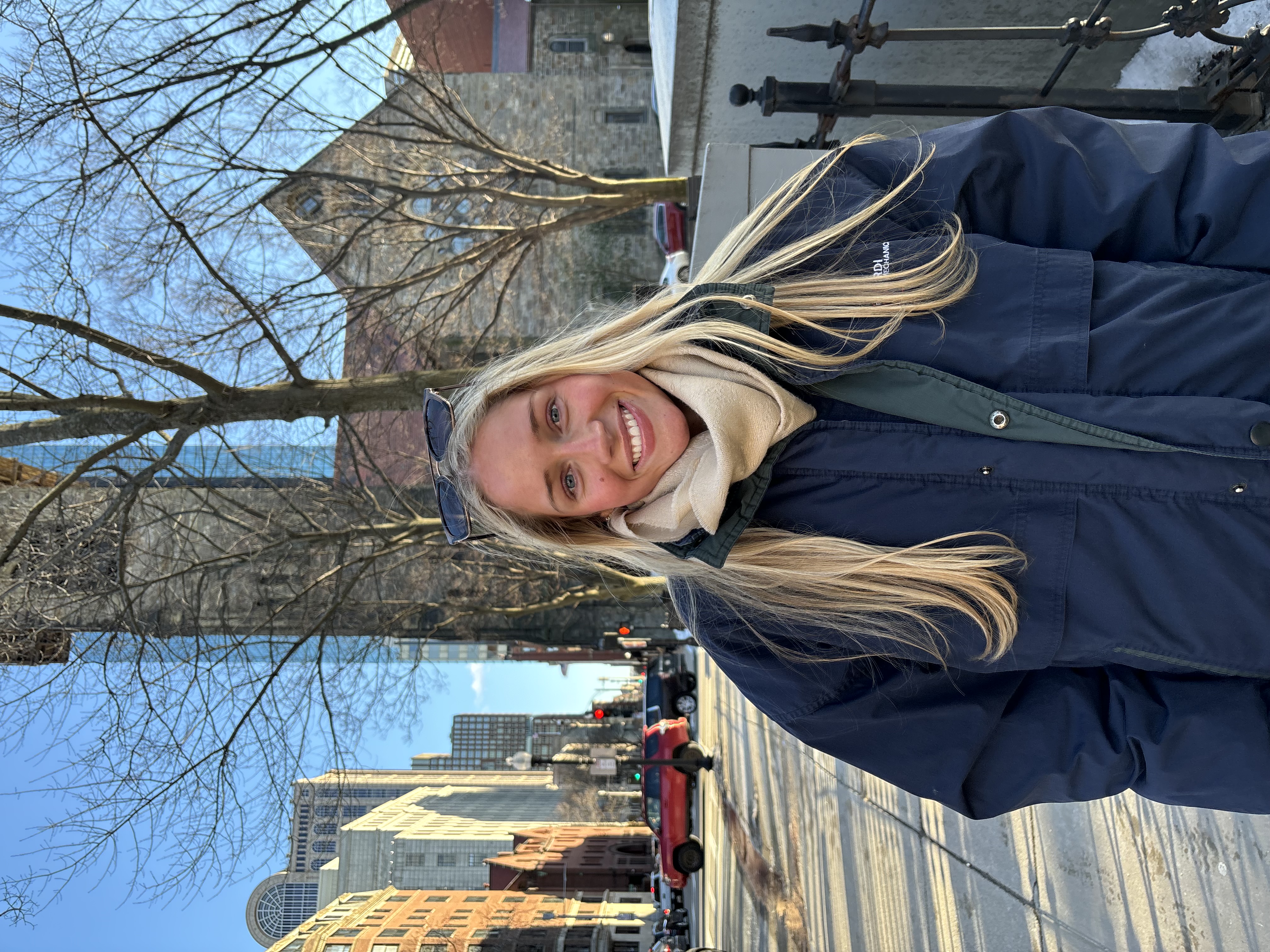 Person standing outdoors on a winter street